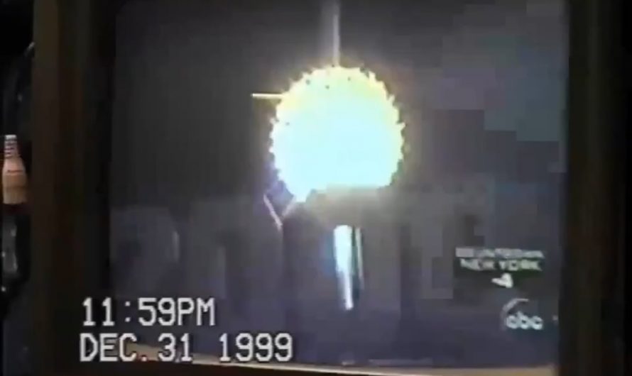 A guy checks his computer on New Year’s night, 2000