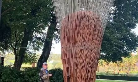 A kinetic sound sphere composed of 850 metal parts, each suspended from a wire