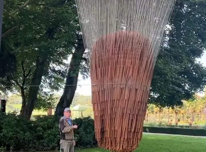 A kinetic sound sphere composed of 850 metal parts, each suspended from a wire