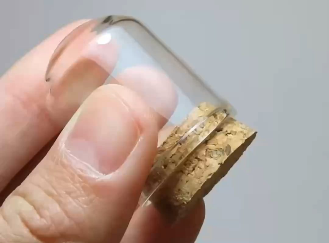 A miniature hobbit house made with polymer clay