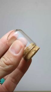 A miniature hobbit house made with polymer clay