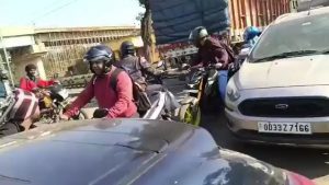 A passenger train in Jharkhand, India hitting a truck stuck in a railway crossing