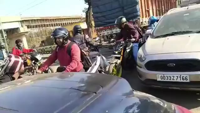 A passenger train in Jharkhand, India hitting a truck stuck in a railway crossing