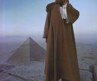 A photo of an Egyptian tour guide on top of the great pyramid in Giza, Egypt 1986