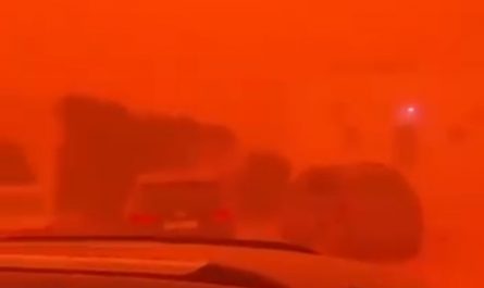 A rare natural phenomenon causes a sandstorm to turn everything red in Libya