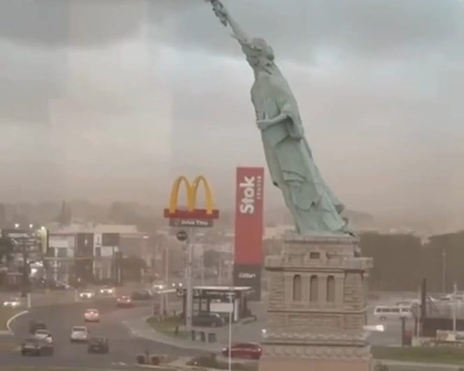 A replica of the Statue of Liberty collapsed over a parking lot after a storm in Brazil