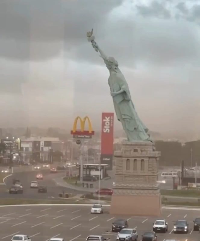 A replica of the Statue of Liberty collapsed over a parking lot after a storm in Brazil