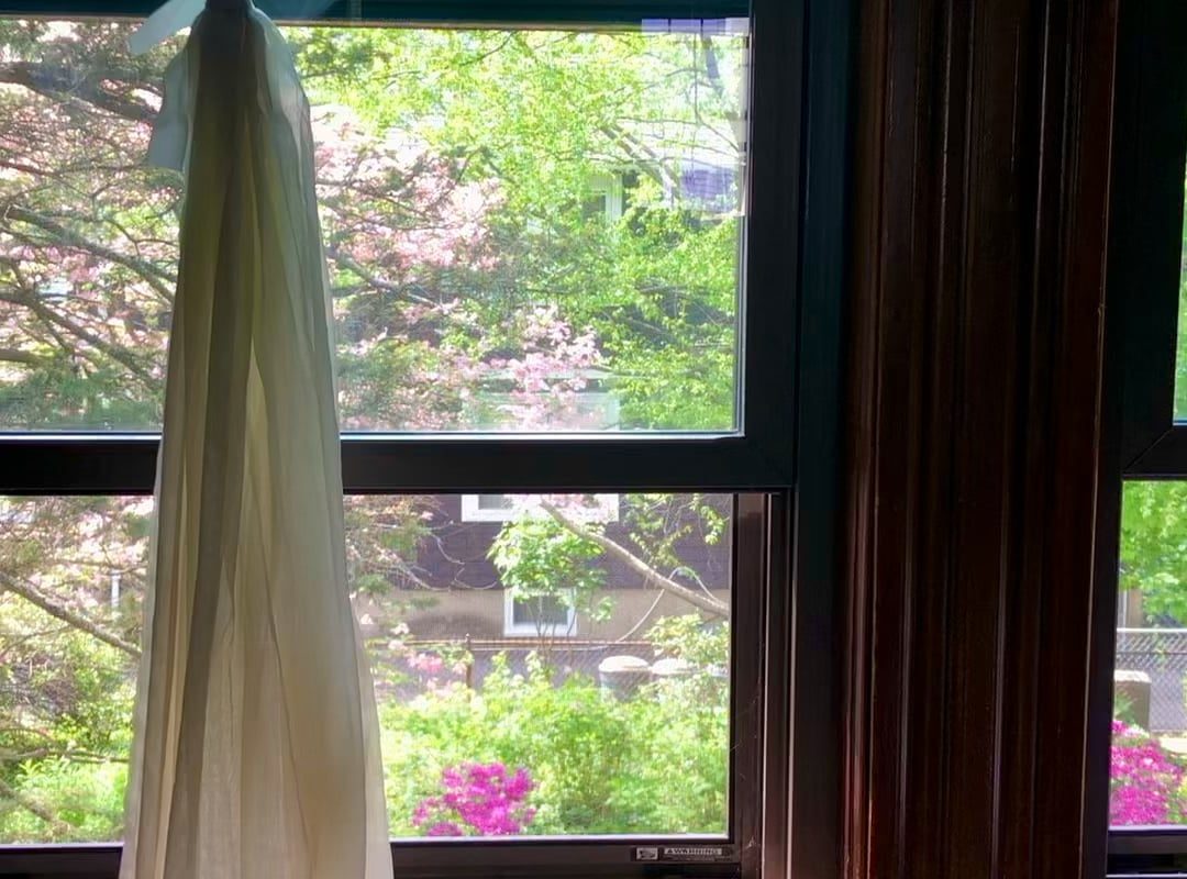 A soft breeze through an open window