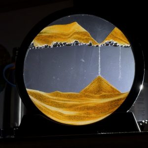 Air bubbles blocking the sand from rushing to the bottom