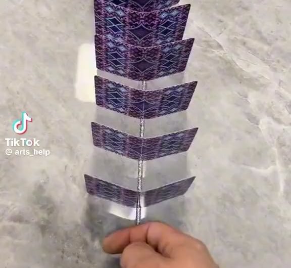 Amazing display of art using dominos of cards