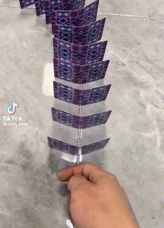 Amazing display of art using dominos of cards