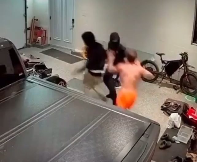 Brave man takes on two home invaders! When they try to escape, he drags one back in for more.