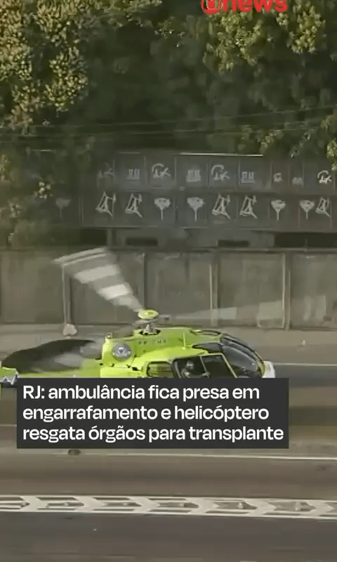 Brazilian helicopter stops on a crowded avenue in order to pick up an organ transplant stuck in traffic