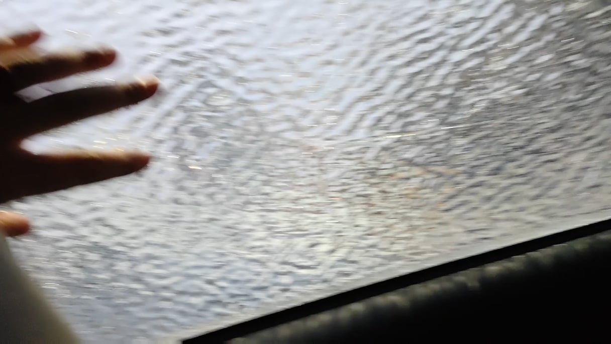 Breaking the ice from my car window