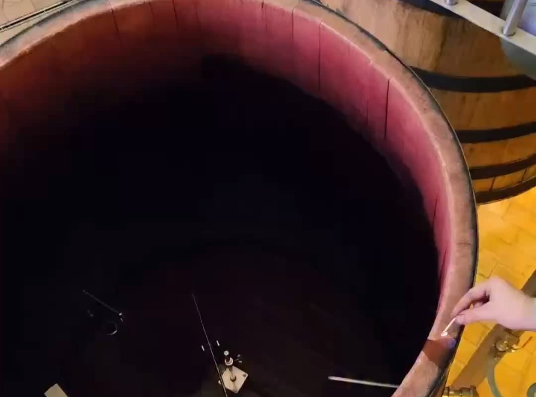 Burning off alcohol residue from a cask that held red wine