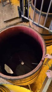 Burning off alcohol residue from a cask that held red wine