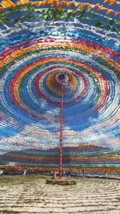 Center of a giant prayer flag wheel in Shangri-La