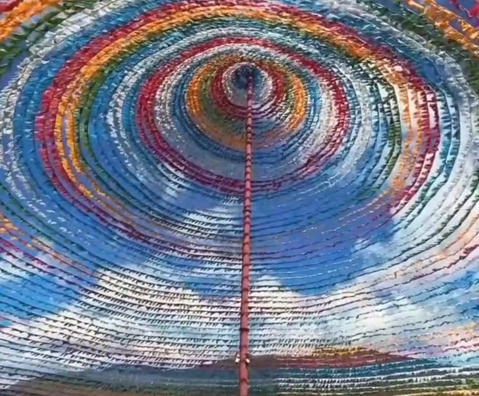 Center of a giant prayer flag wheel in Shangri-La