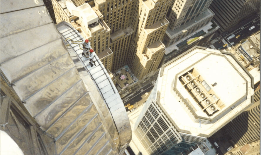 Checking the steel spire of the Chrysler Building for water leaks, New York