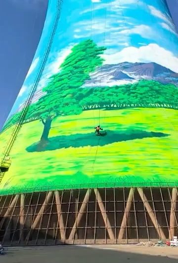 China is starting to let artists have fun with natural-draft cooling towers.. and it’s utterly amazing..