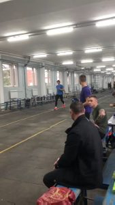 Competitive firefighter climbs up ladder