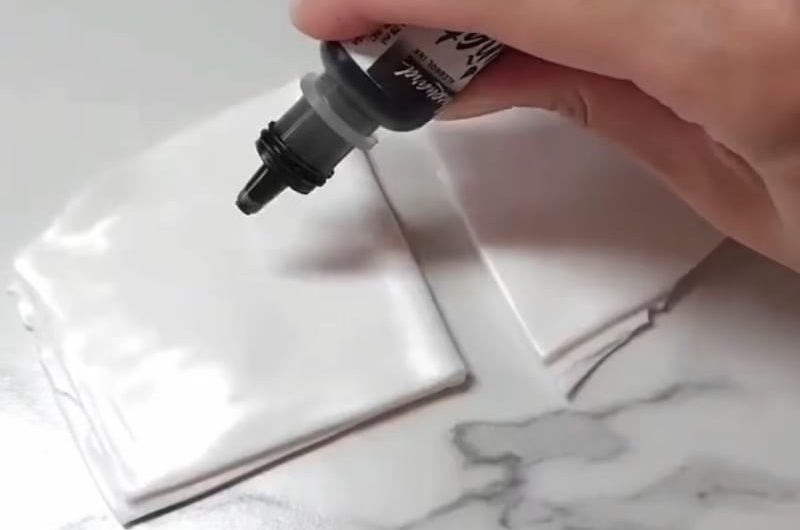 Creating earrings from polymer clay.