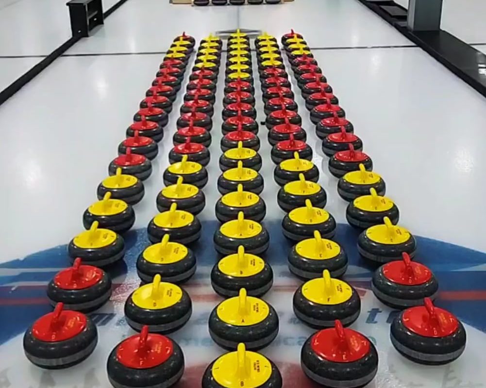 Curling stones collide in a perfect chain reaction