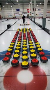Curling stones collide in a perfect chain reaction