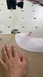 Cutting fabric so smoothly it looks like he’s slicing through foam