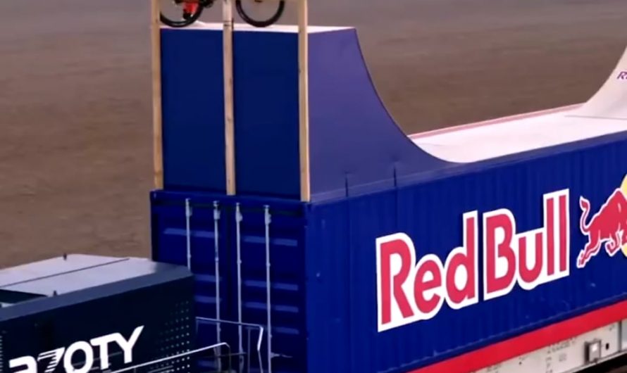 Dawid Godziek rides on top of a moving train! While doing flips…