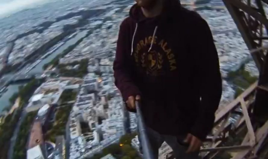 Dude climbs the Eiffel Tower without permission.