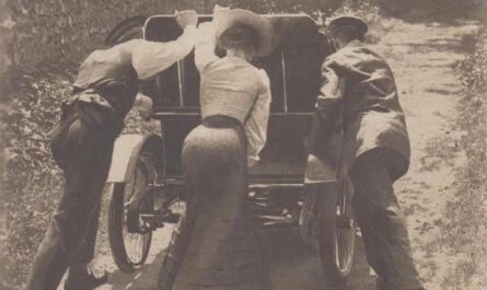 Early cars used gravity to move the fuel to the motor which made climbing hills dificult. One trick was putting them in reverse or try to go up as fast as possible before it stalled, like the car in the photo. Source in comment. Photo circa 1900s