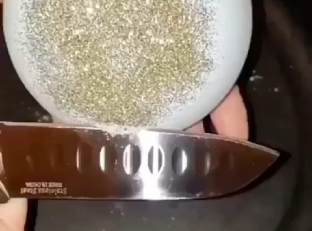 Floral foam or Glittery bath bomb not sure. But looks satisfying