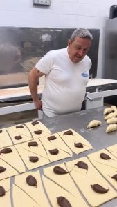 Folding croissants with chocolate filling