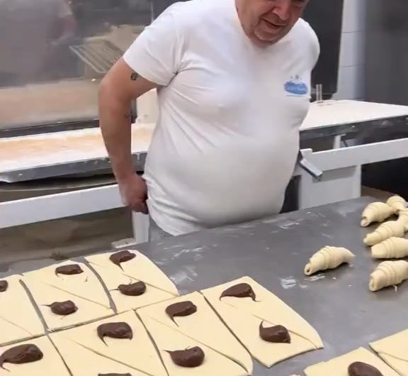 Folding croissants with chocolate filling