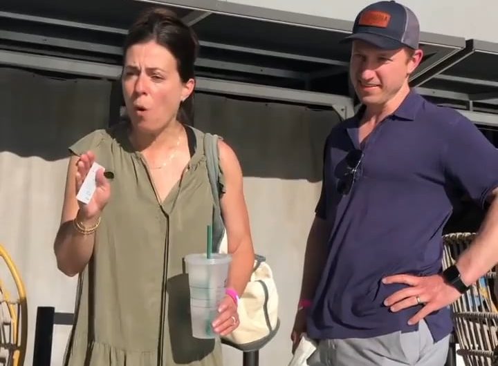 Group gets shamed for harassing two women kissing in a swimming pool