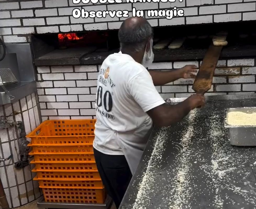 He's had a lot of experience getting bagels out of that oven.