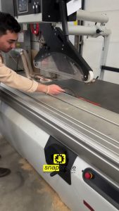 High-Precision Wood Saw with Integrated Snapbrake Safety System in Action.