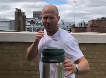 Jason Statham removing bottle cap with kick