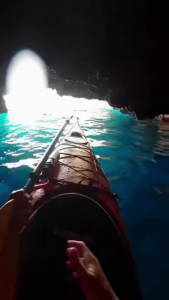 Kayaking upside down to swim out of a cave: