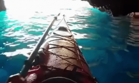 Kayaking upside down to swim out of a cave: