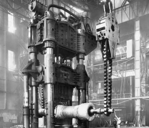 Krupp Steam-hydraulic forging press in 1920s. Man can be seen at the very end of it in the right side.