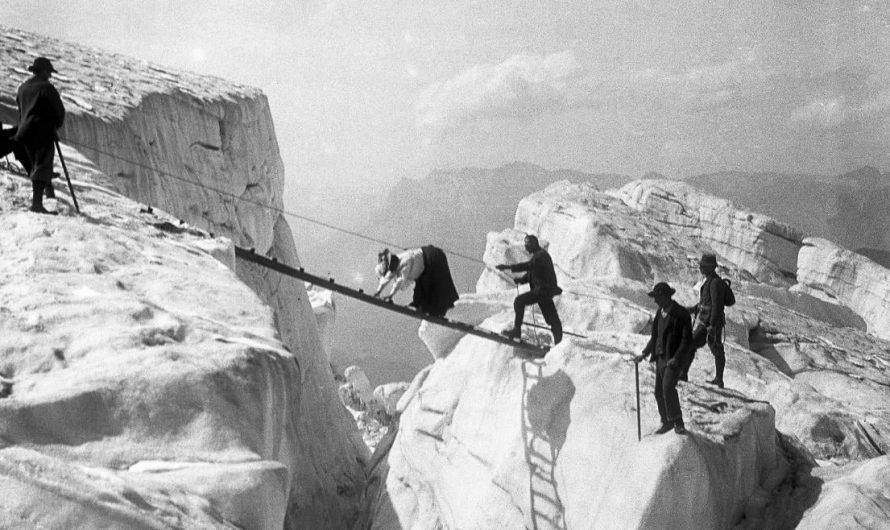 Lady crossing over the glacier at Chamonix Climb using the lader method, circa 1890