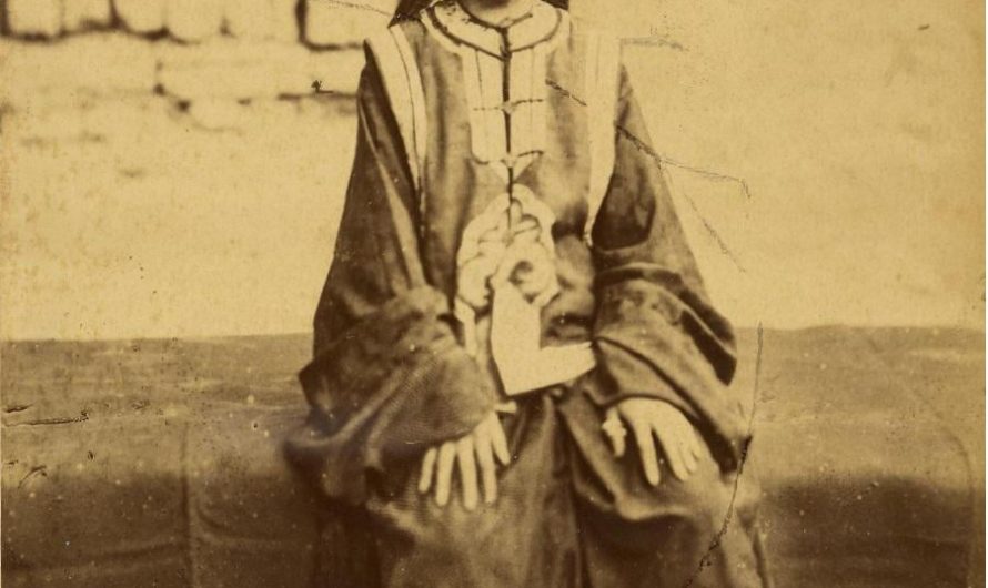 Lady in traditional clothes from Xinjiang, China, 1875,