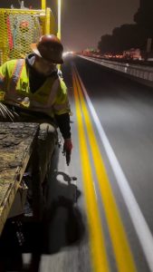 Laying reflective road markers