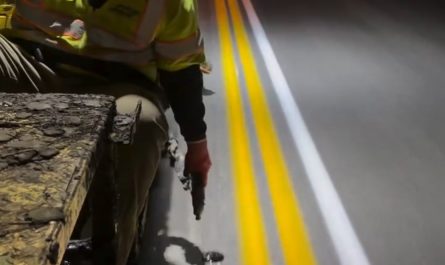 Laying reflective road markers