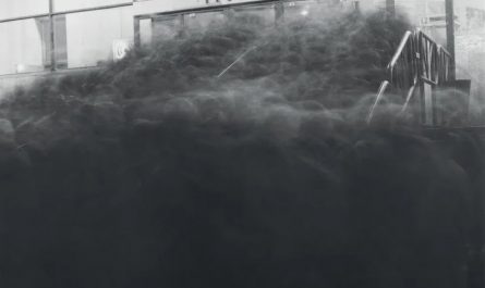 Long exposure photograph of a crowd near the entrance to the Vasileostrovskaya subway station in Saint Petersburg (1991) by Russian photographer Alexey Titarenko from the book "City of shadows"