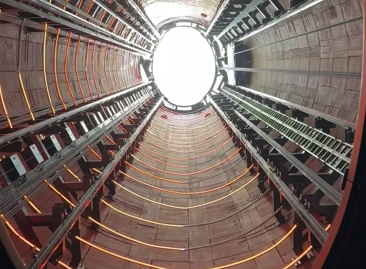Looking up while riding the chimney lift at Battersea power station