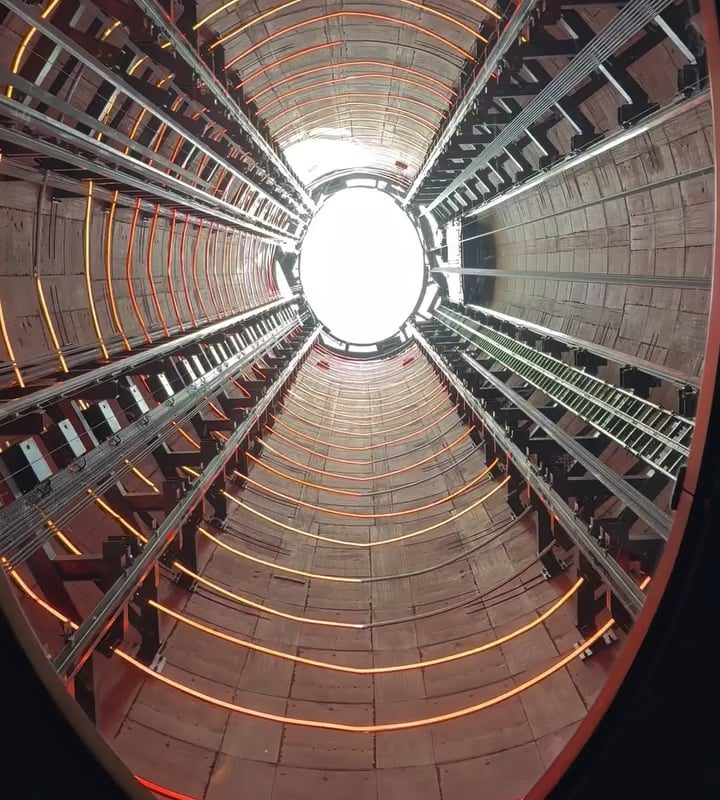 Looking up while riding the chimney lift at Battersea power station