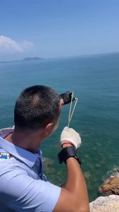 Man invents wrist-fired fishing slingshot that casts like Spider-Man.